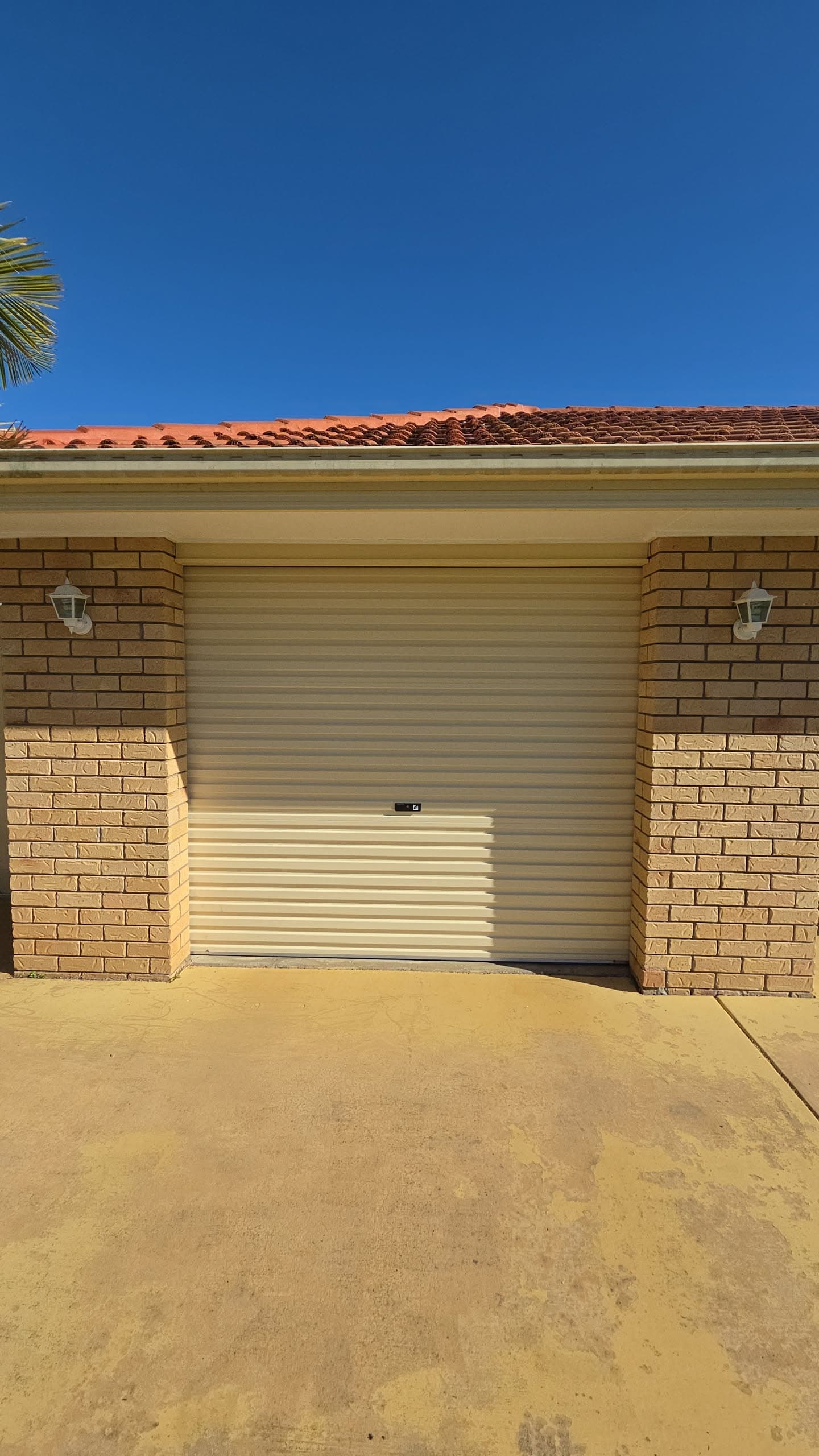 Finished garage door installation on a Sunshine Coast home