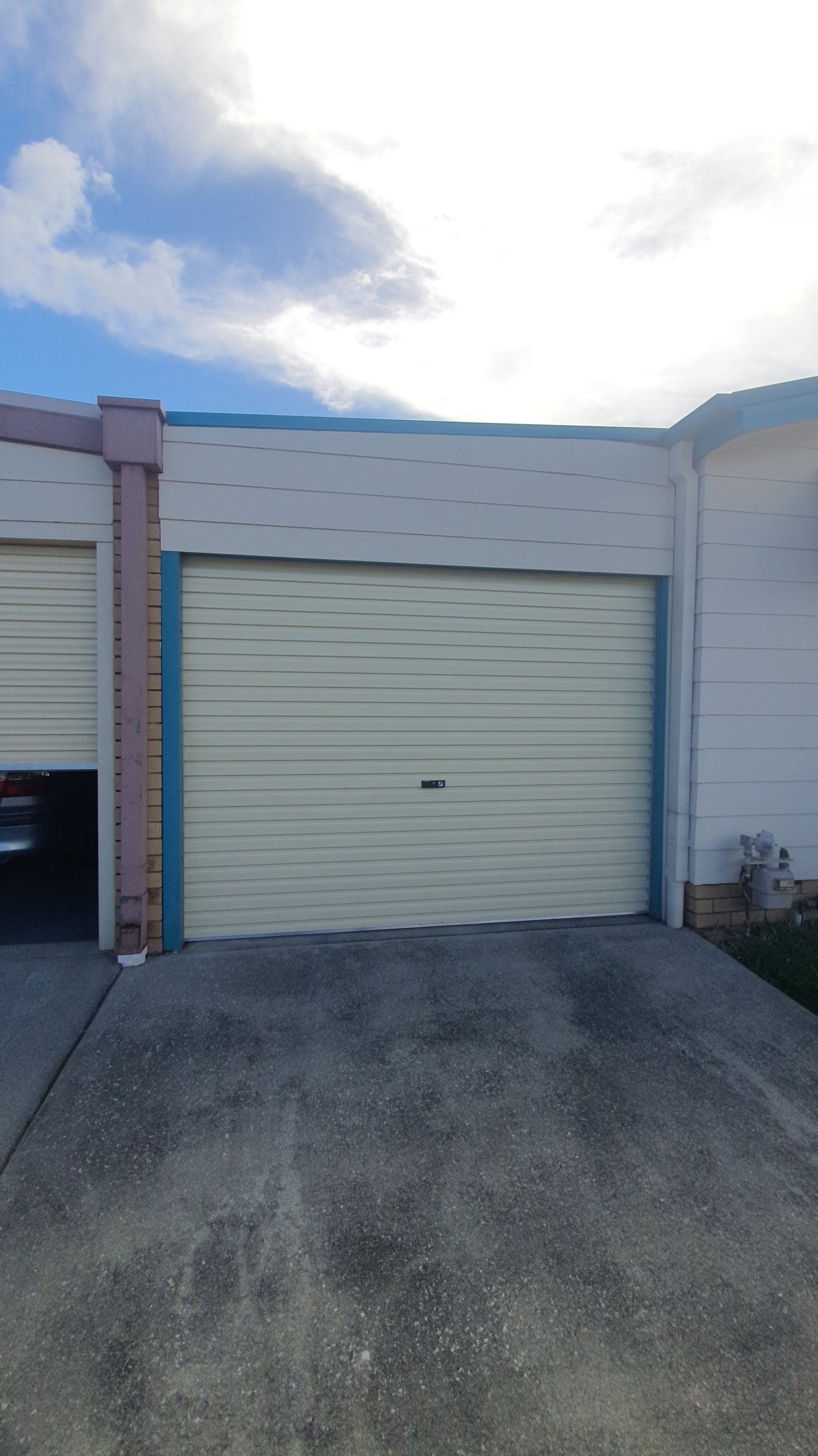 Garage door with a new opener on the Sunshine Coast
